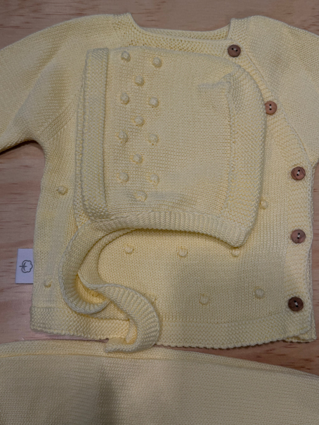 Tre pezzi con cuffietta giallo