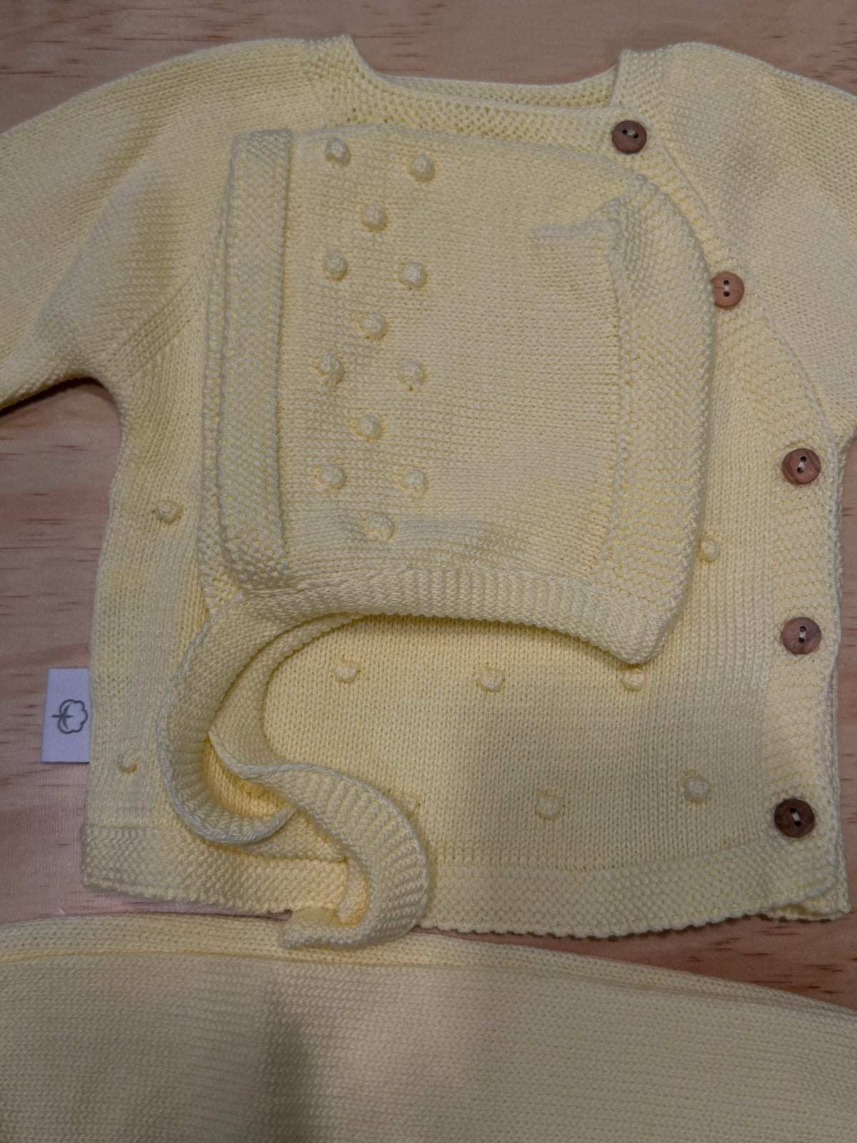 Tre pezzi con cuffietta giallo