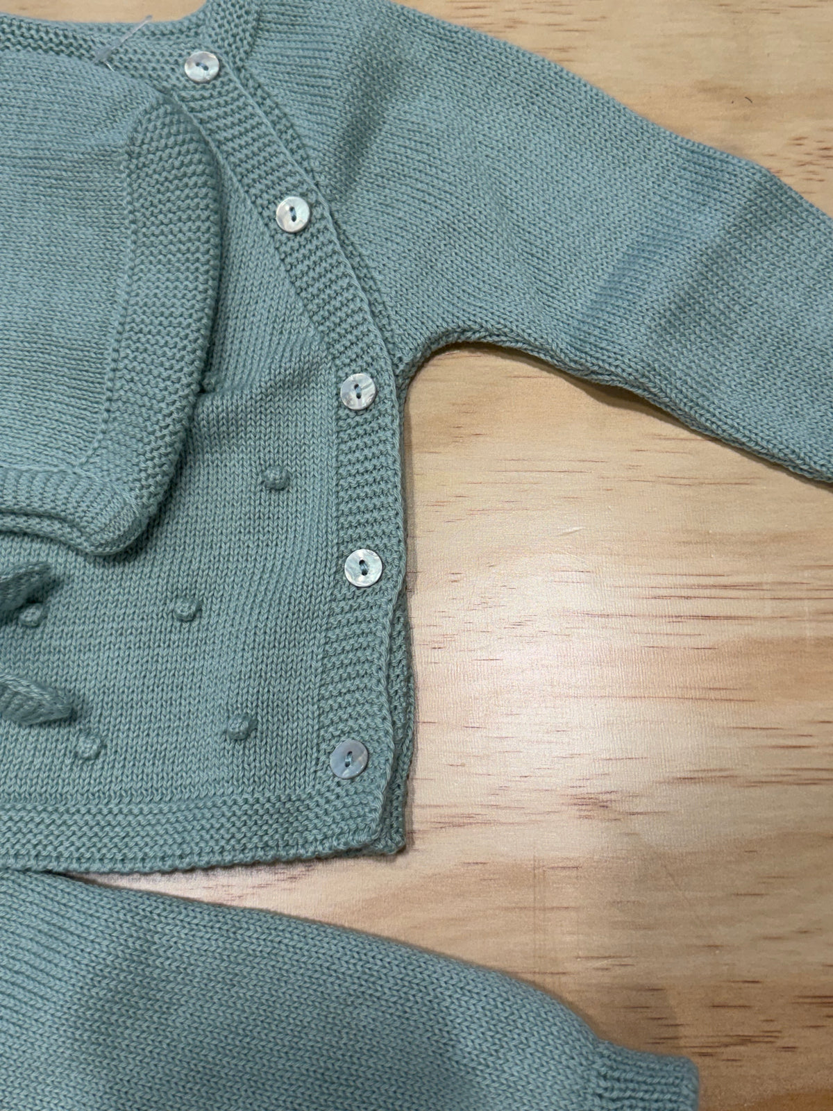 Tre pezzi con cuffietta verde