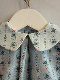 Camicia azzurra fiorellini