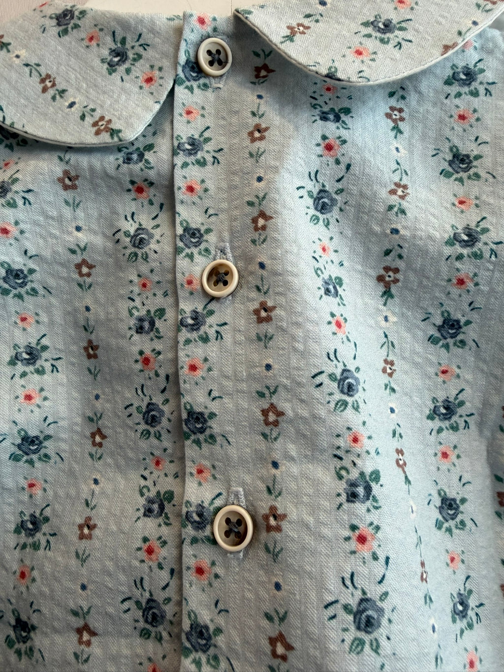 Camicia azzurra fiorellini