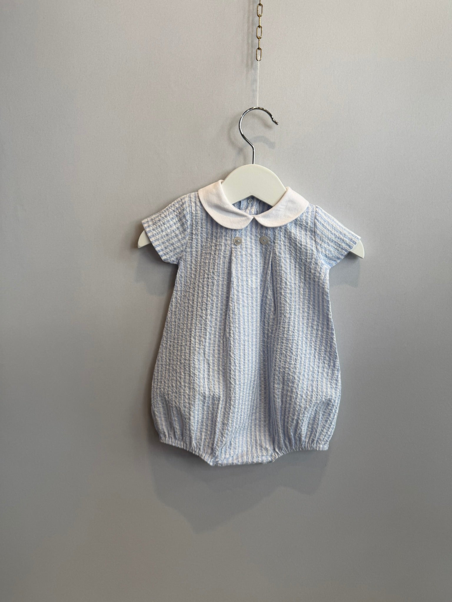 Pagliaccetto in cotone bianco e azzurro