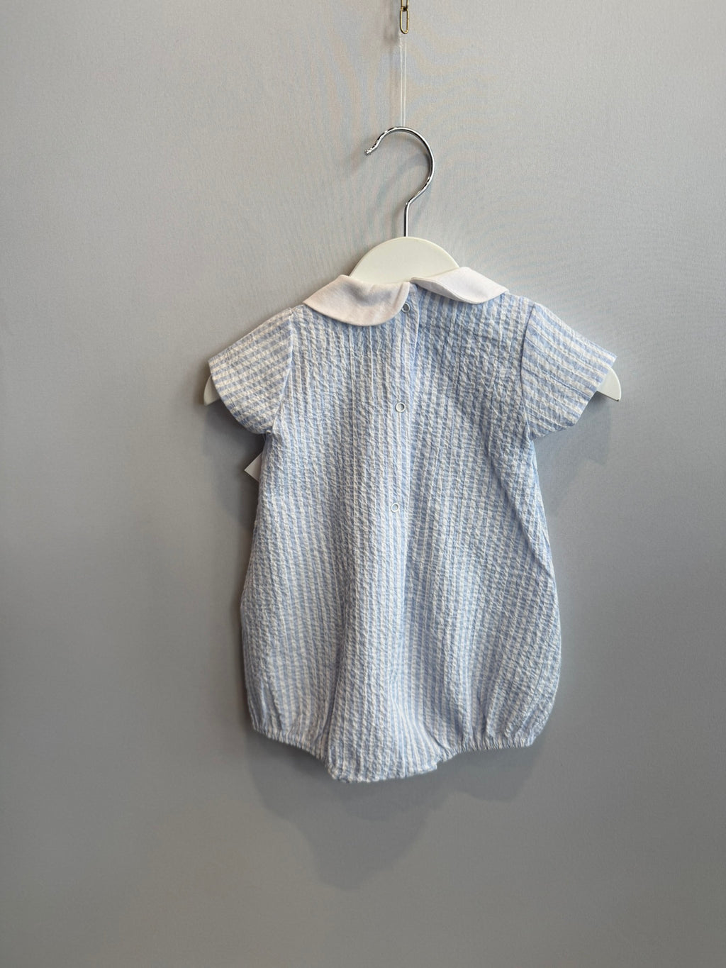 Pagliaccetto in cotone bianco e azzurro