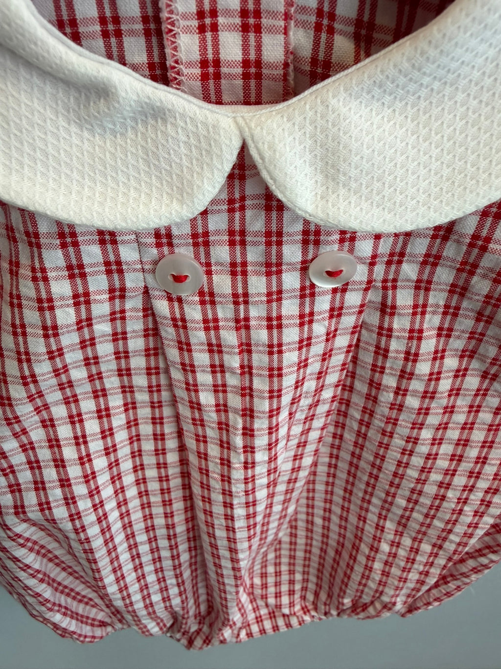 Pagliaccetto bianco e rosso