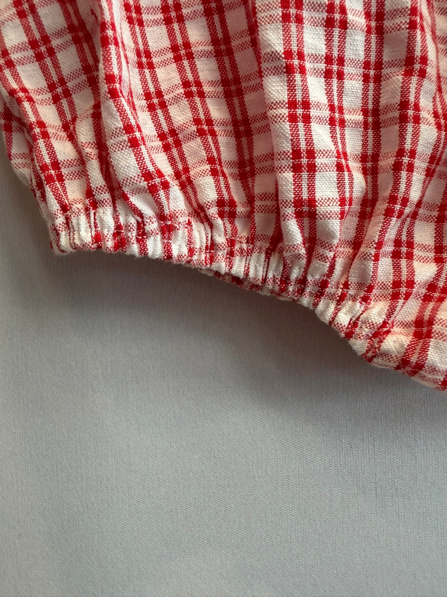 Pagliaccetto bianco e rosso