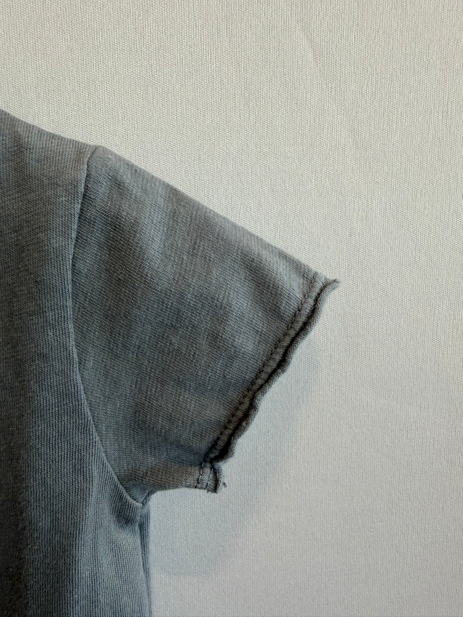 Body in cotone blu con bottoni in legno