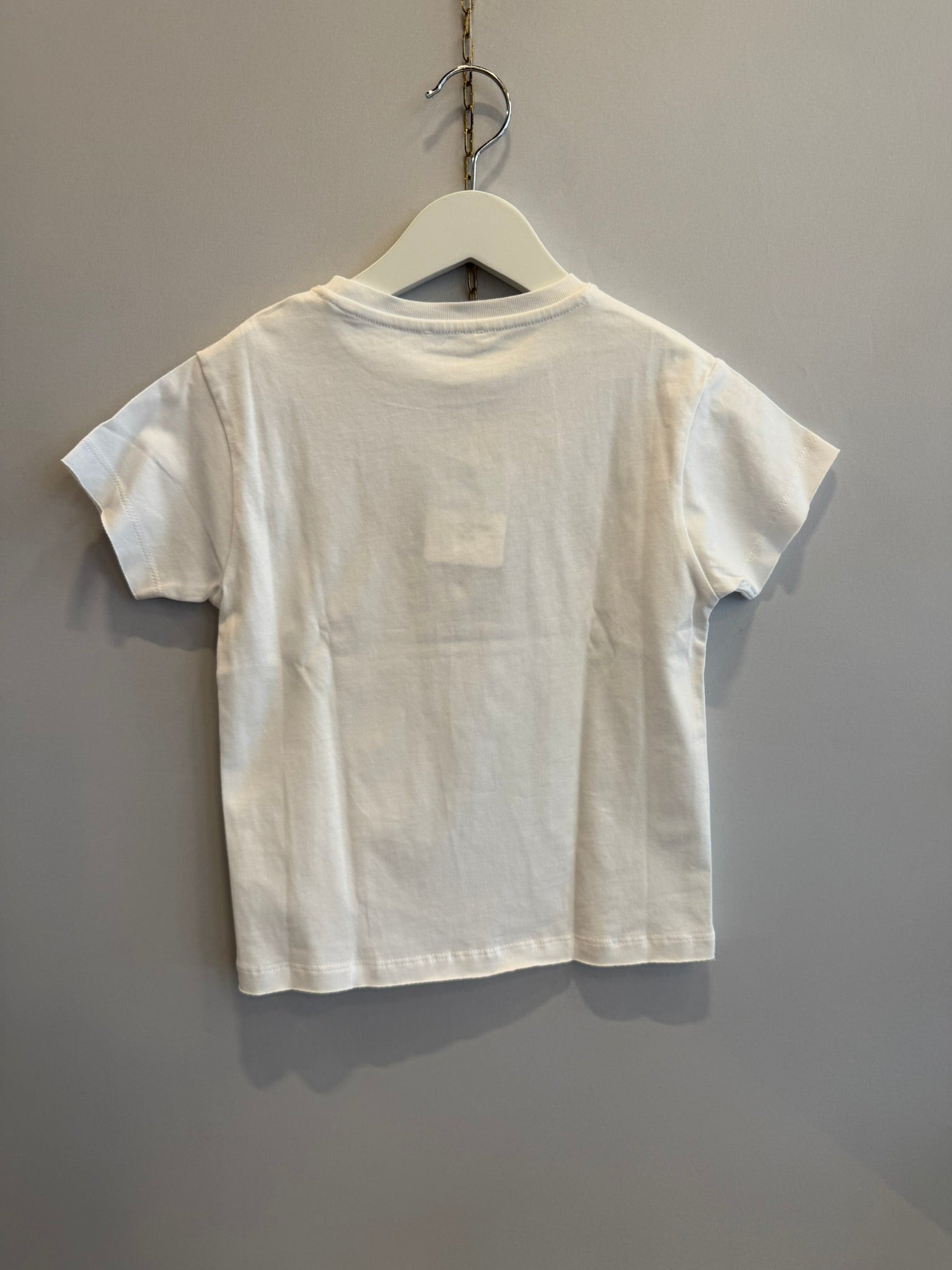 T-shirt bianca con piantina azzurra
